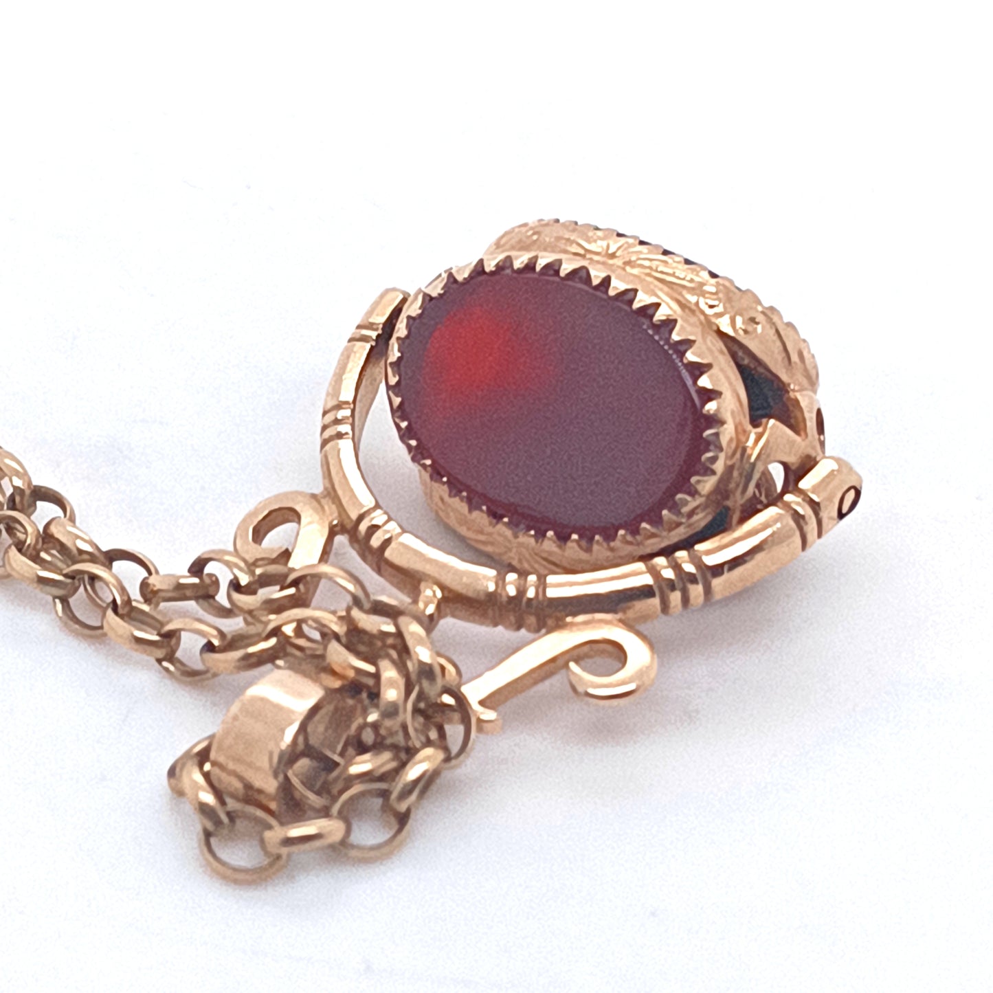 9k Gold Swivel 3 Stones Fob on Belcher Chain